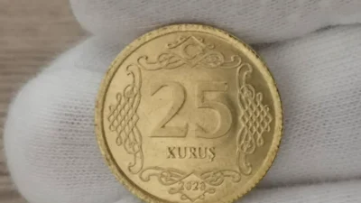 Bir dönem günlük alışverişlerde sıklıkla kullandığımız altın renkli 25 kuruşluk