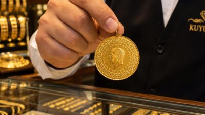KÜRESELDE ONS ALTIN PSİKOLOJİK SINIRIN ALTINA SARKTI Dünya piyasalarında esen